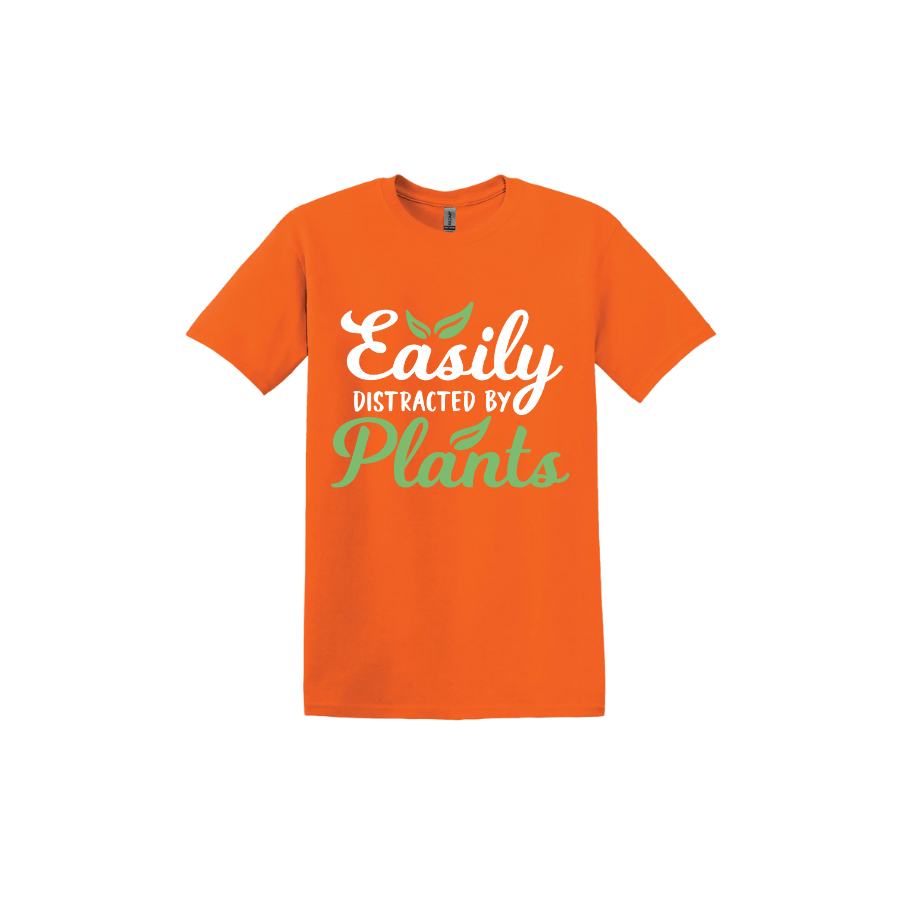 Orange unisex tshirt with text reading 'Easily Distracted By Plants'.