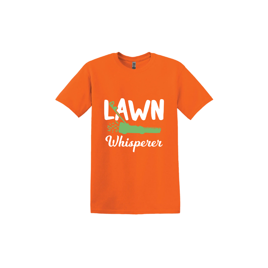 Orange unisex tshirt with white text that reads 'Lawn Whisperer' alongside a graphic of a green lawnmower cutting grass.