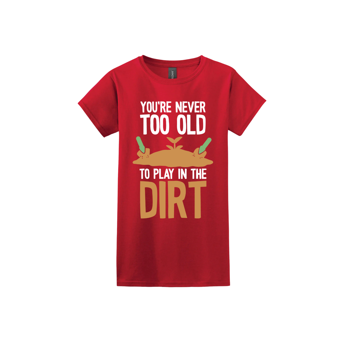 Red womens tshirt with text that reads 'You're never too old to play in the dirt' along side graphics of a mound of dirt with two gardening trowels.