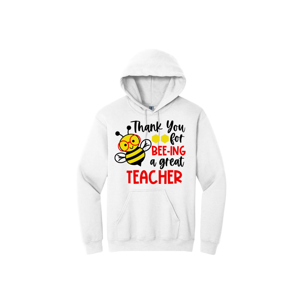 White unisex hoodie with text that reads 'Thank you for bee-ing a great teacher' alongside of graphics of honeycombs and a bee wearing red glasses.