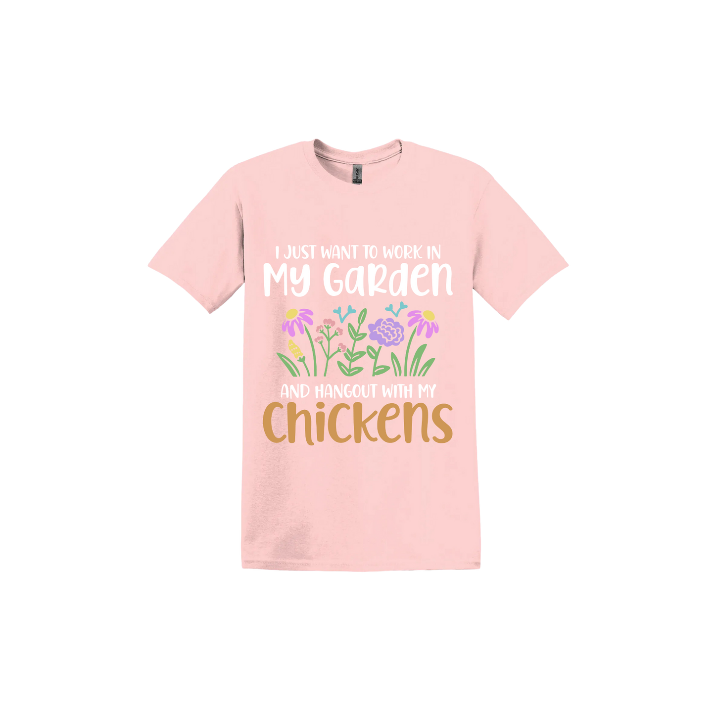 Light pink unisex tshirt with text that reads 'I just want to work in my garden and hangout with my chickens' with graphics of flowers in the center.