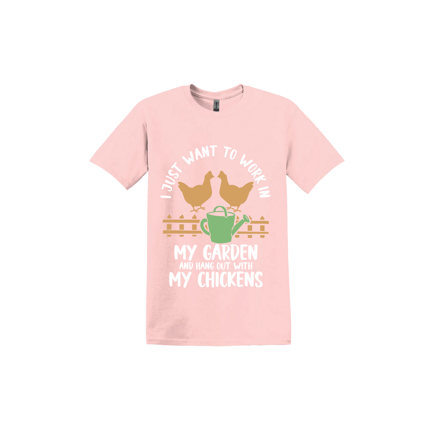 Light pink unisex tshirt with text that reads 'I just want to work in my garden and hangout with my chickens' with graphics of two chickens above a picket fence and a green watering can.