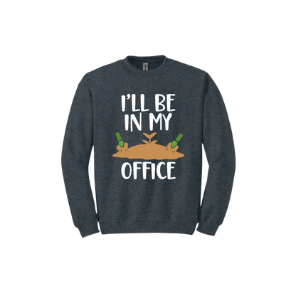 Dark heather unisex sweatshirt with text reading 'I'll be in my office' alongside a graphic of dirt with two green shovels.