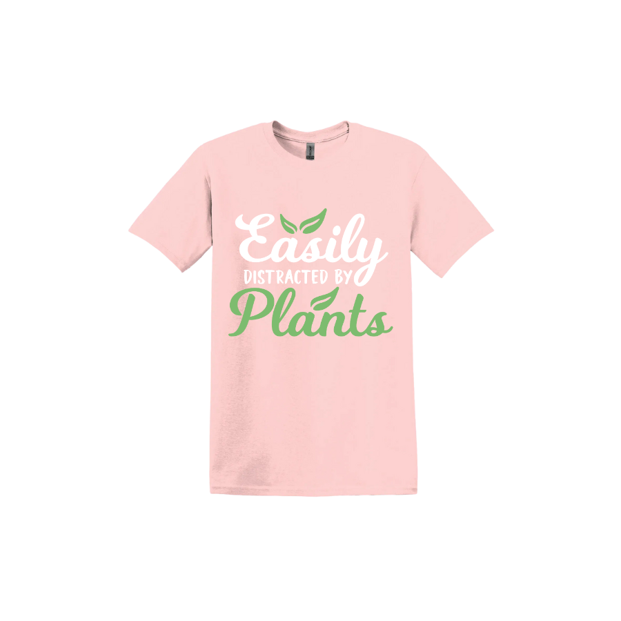 Light pink unisex tshirt with text reading 'Easily Distracted By Plants'.