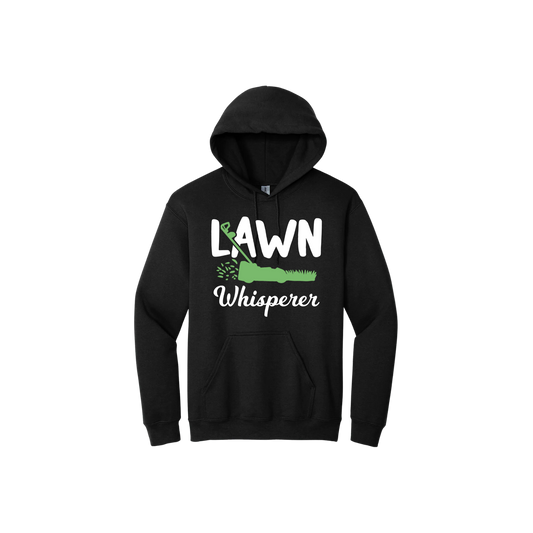 Black unisex hoodie with white text that reads 'Lawn Whisperer' alongside a graphic of a green lawnmower cutting grass.