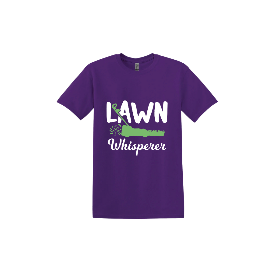 Purple unisex tshirt with white text that reads 'Lawn Whisperer' alongside a graphic of a green lawnmower cutting grass.