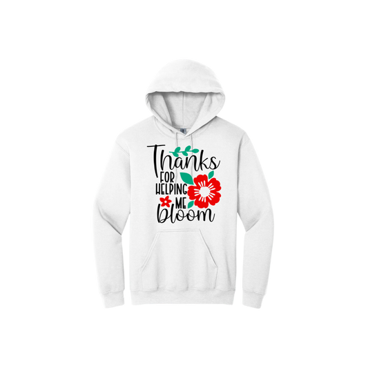 White unisex hoodie featuring text that reads 'Thanks for helping me bloom' along side graphics of red flowers and green leaves.