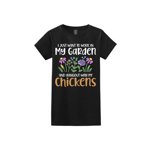 Black womens tshirt with text that reads 'I just want to work in my garden and hangout with my chickens' with graphics of flowers in the center.